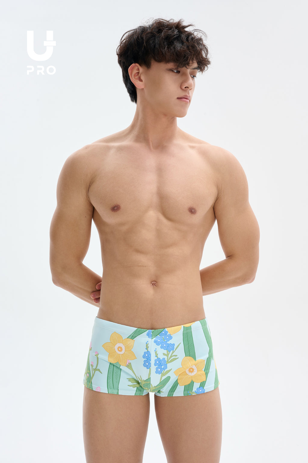 UPRO men's Narcissus Print Swim Trunks – Green Floral – studio fit detail