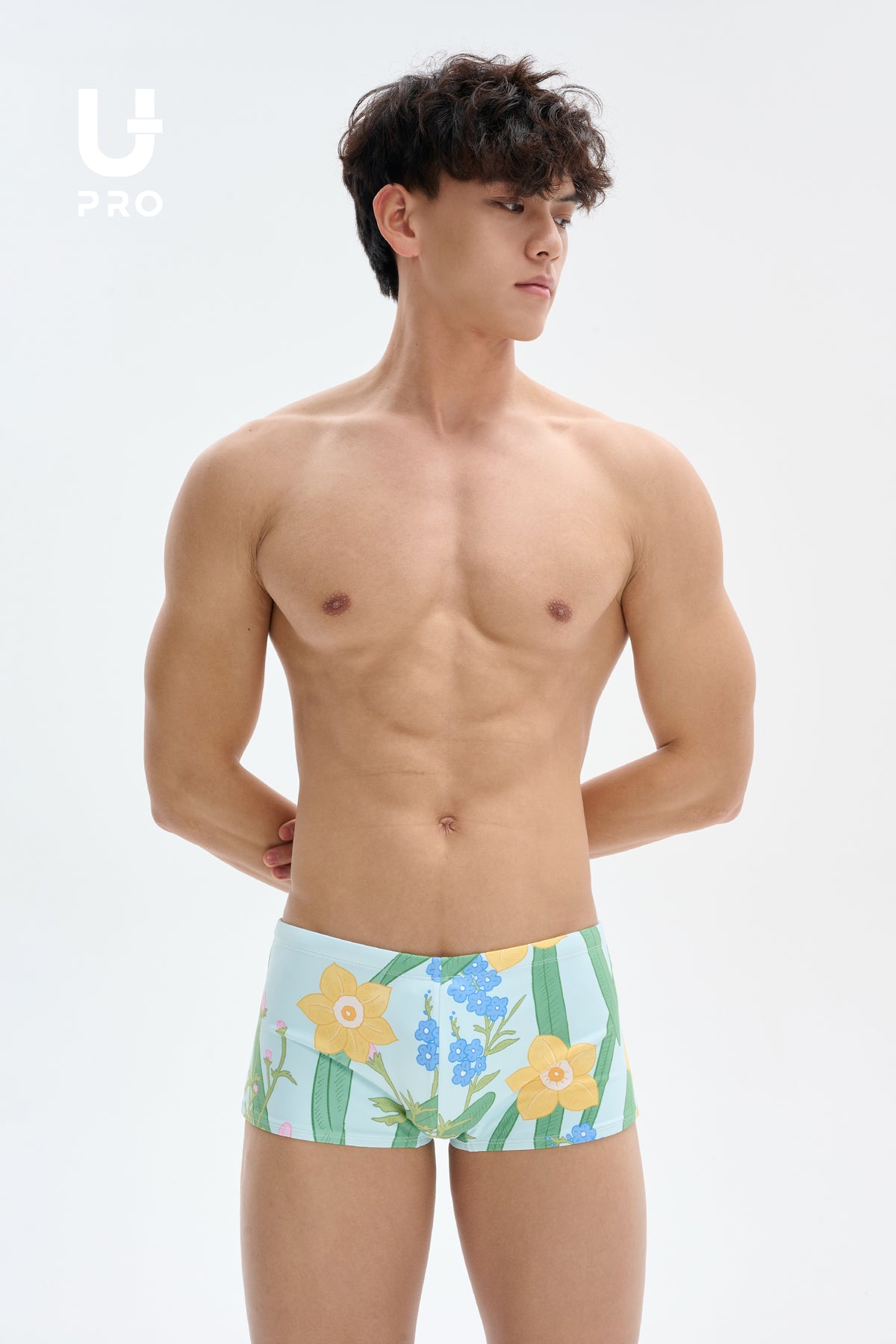 UPRO men's Narcissus Print Swim Trunks – Green Floral – studio fit detail