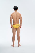 UPRO men's American Stripe Triangle Swim Brief – Yellow Stripe – studio model view, photo 3 of 3