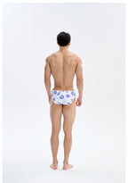 UPRO men's Shell Print Swim Brief – White Blue Shell – studio model view, photo 2 of 3
