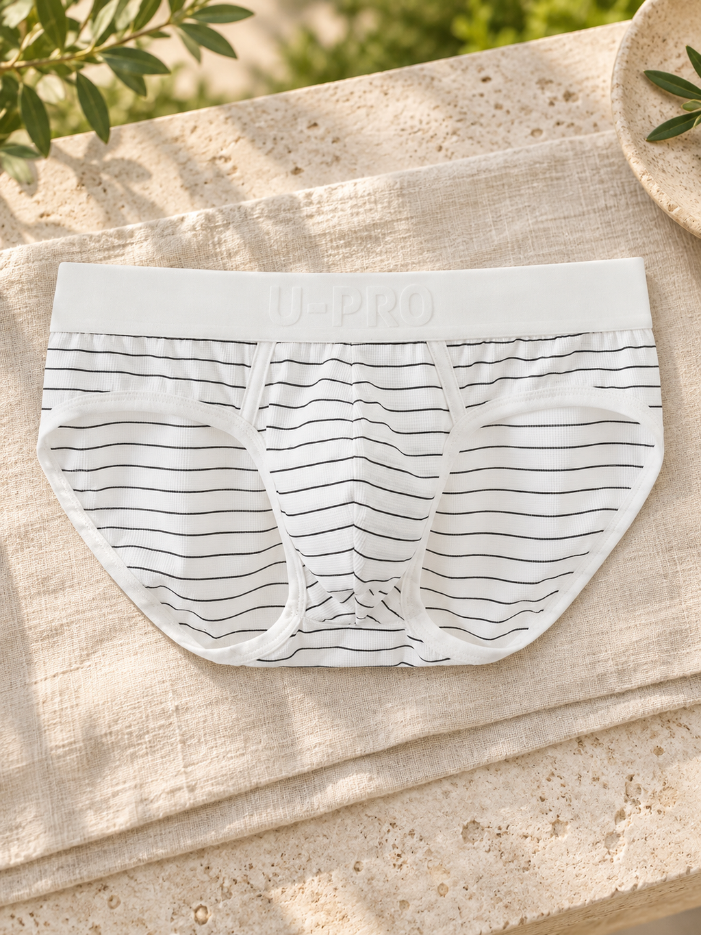 UPRO men's Cool-Touch Striped Brief – White – outdoor product still life