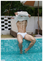 UPRO Weisser Badeslip Herren mit Logo-Print – Outdoor-Kampagnenfoto, Foto 2 von 2