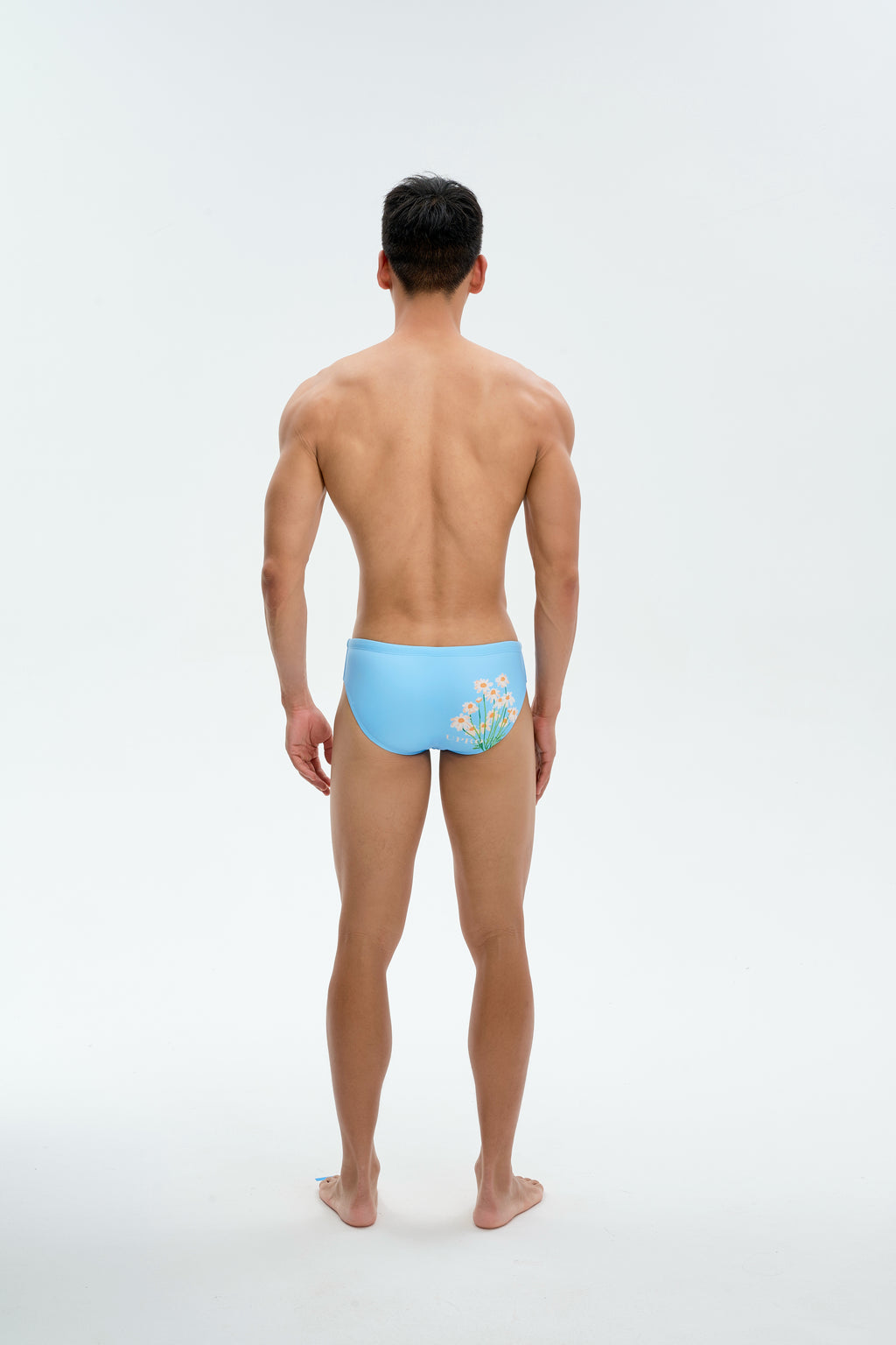 UPRO men's Daisy Print Swim Brief – Blue Daisy – studio back view