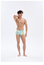 UPRO men's Narcissus Print Swim Trunks – Green Floral – studio model view, photo 2 of 3