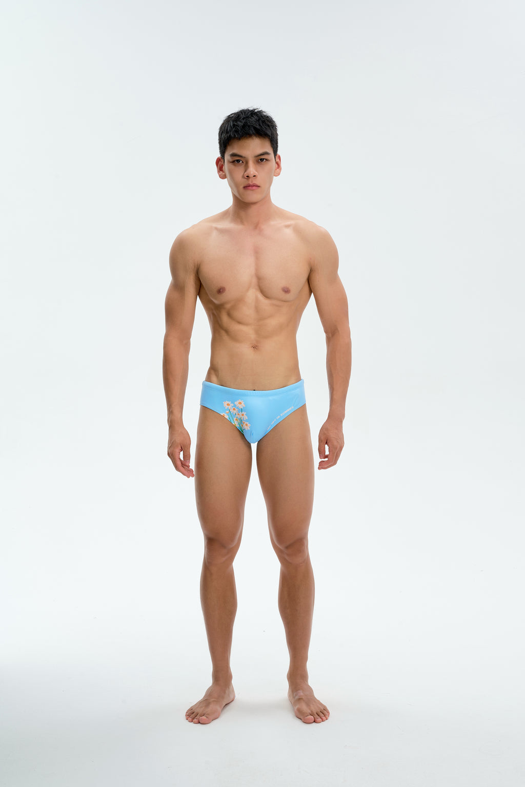 UPRO men's Daisy Print Swim Brief – Blue Daisy – studio front view