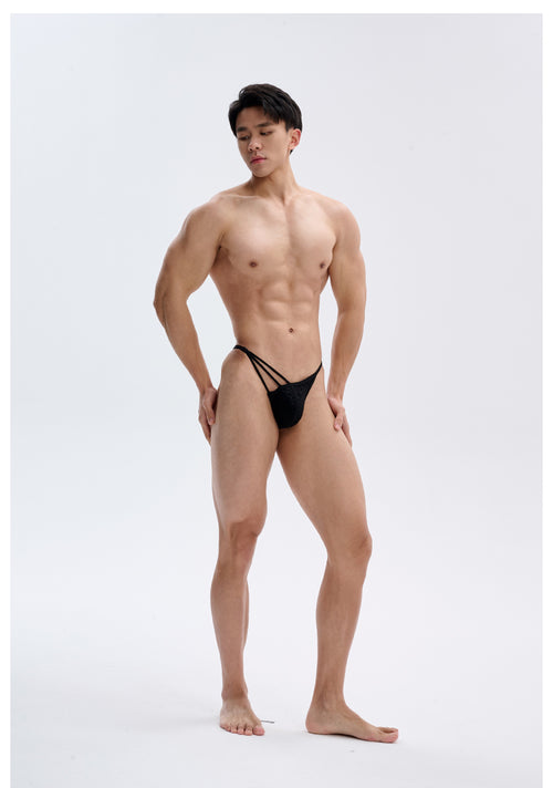 UPRO men's Asymmetric Strap Brief – Black – studio model view, photo 1 of 3