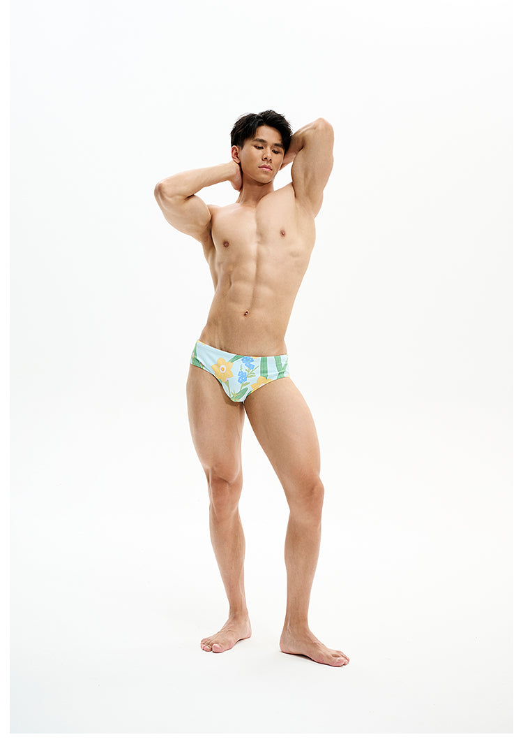 UPRO men's Narcissus Print Swim Brief – Green Floral – studio model view, photo 2 of 3