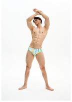 UPRO men's Narcissus Print Swim Brief – Green Floral – studio model view, photo 3 of 3