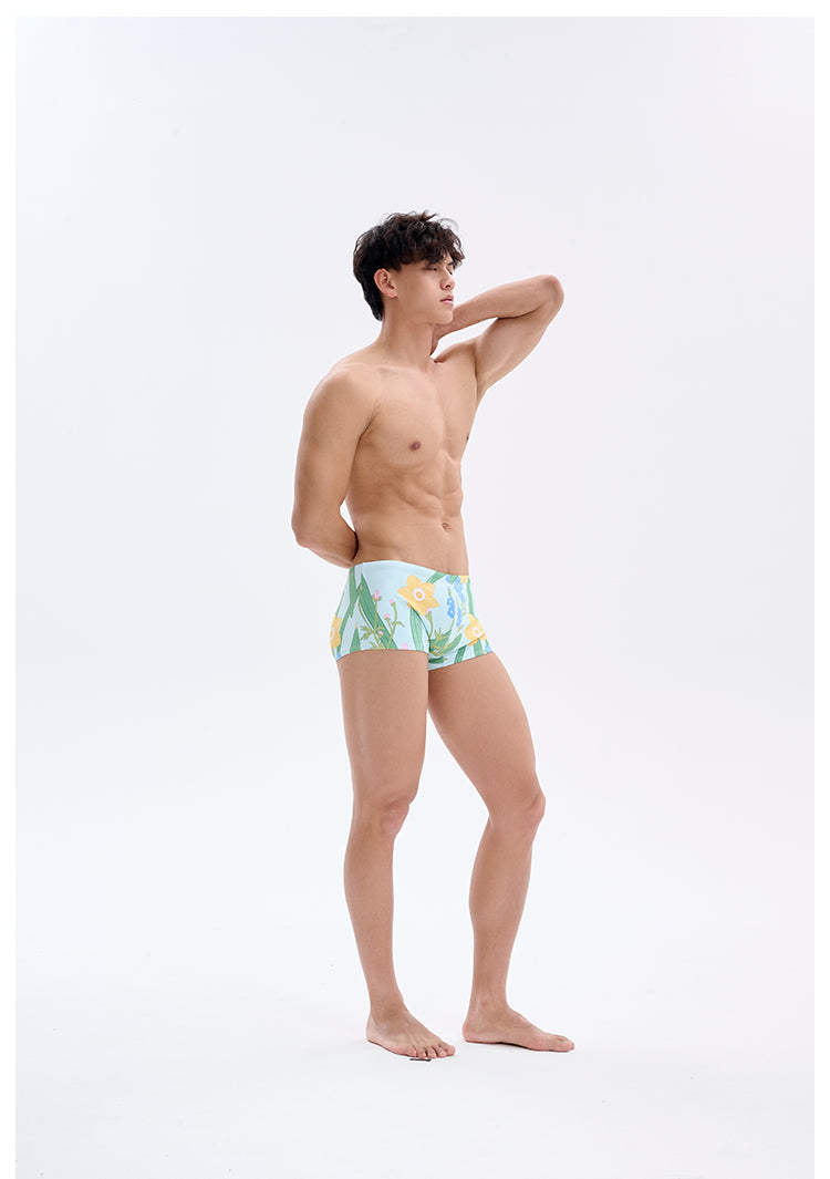 UPRO men's Narcissus Print Swim Trunks – Green Floral – studio model view, photo 1 of 3