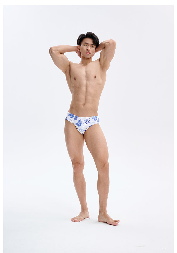 UPRO men's Shell Print Swim Brief – White Blue Shell – studio model view, photo 1 of 3